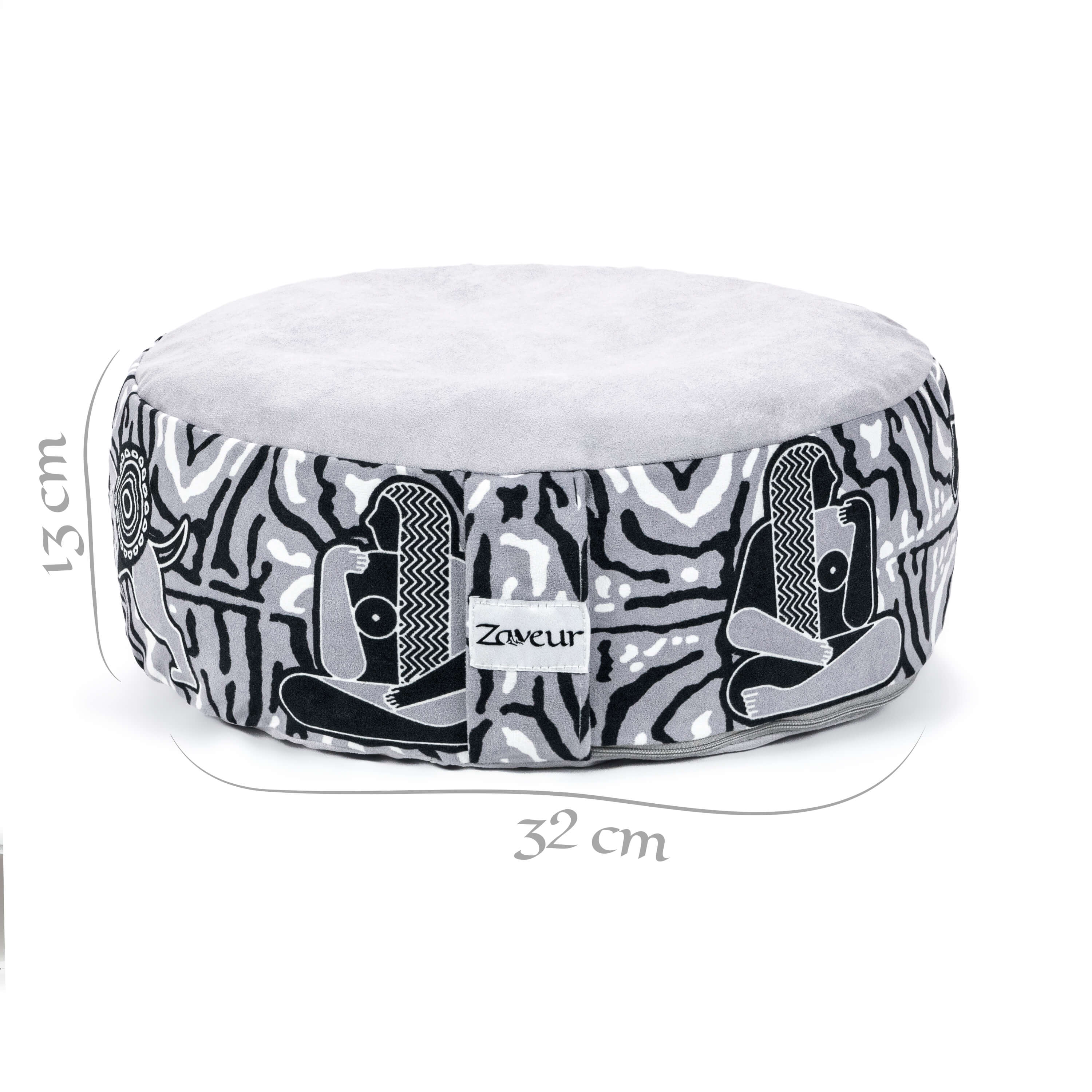 Round meditation pillow with black and white patterns on a white background