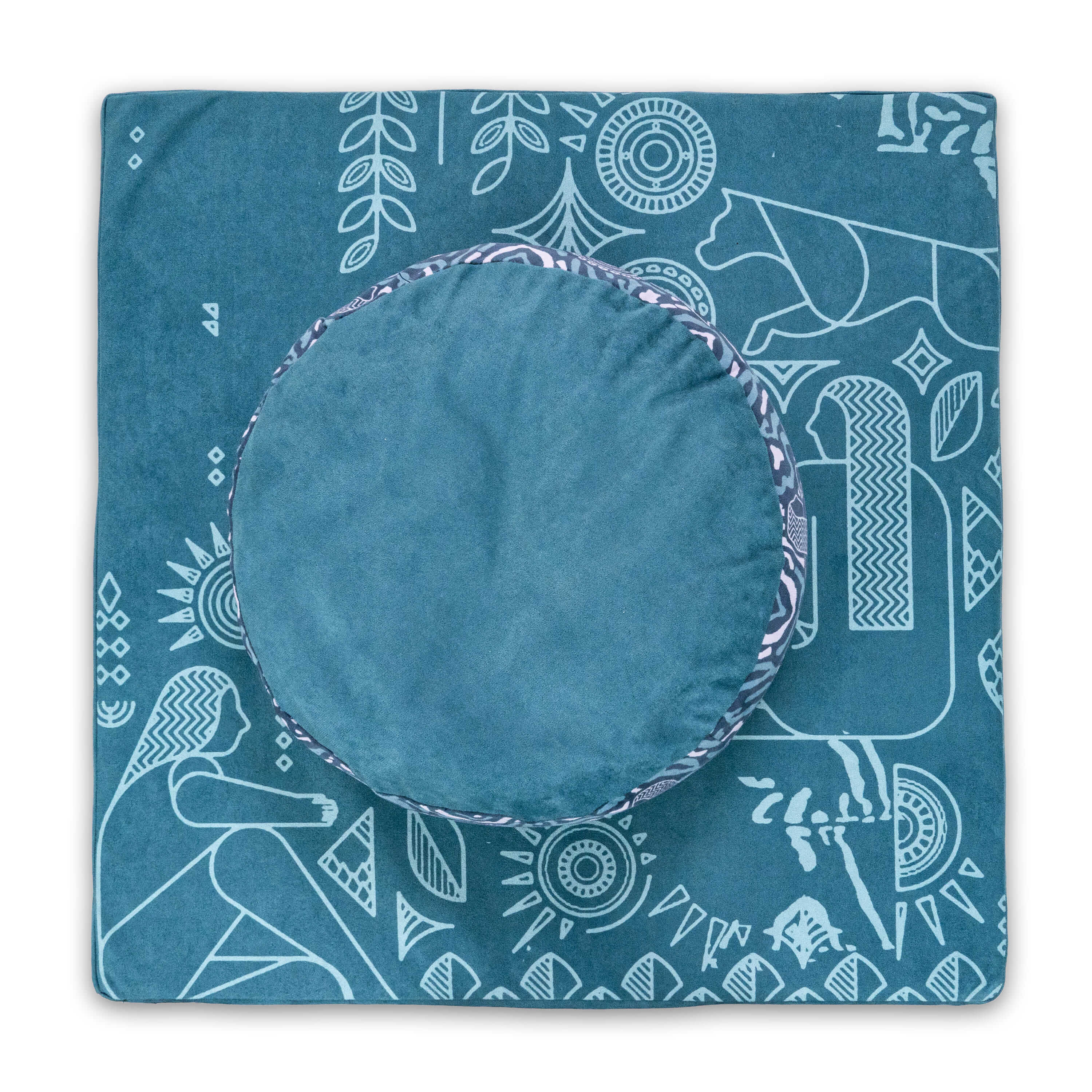 Blue cushion with white patterns on a matching blue fabric background