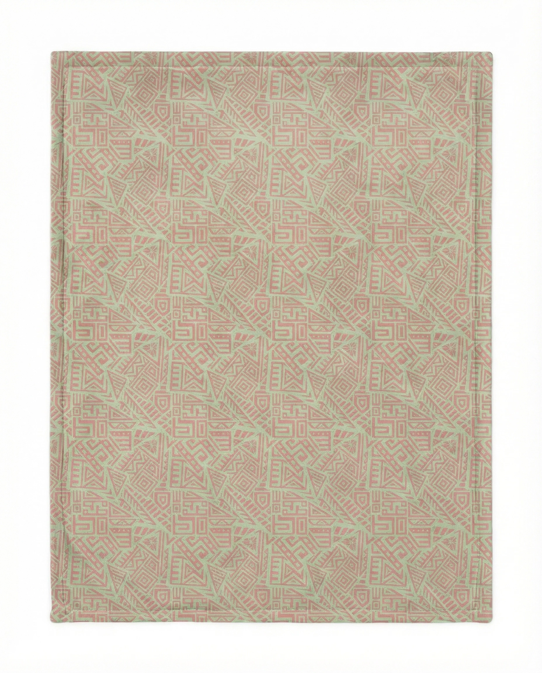 Back view of a pink fleece blanket featuring an African-inspired geometric pattern with soft green tribal shapes, shown flat on a white background