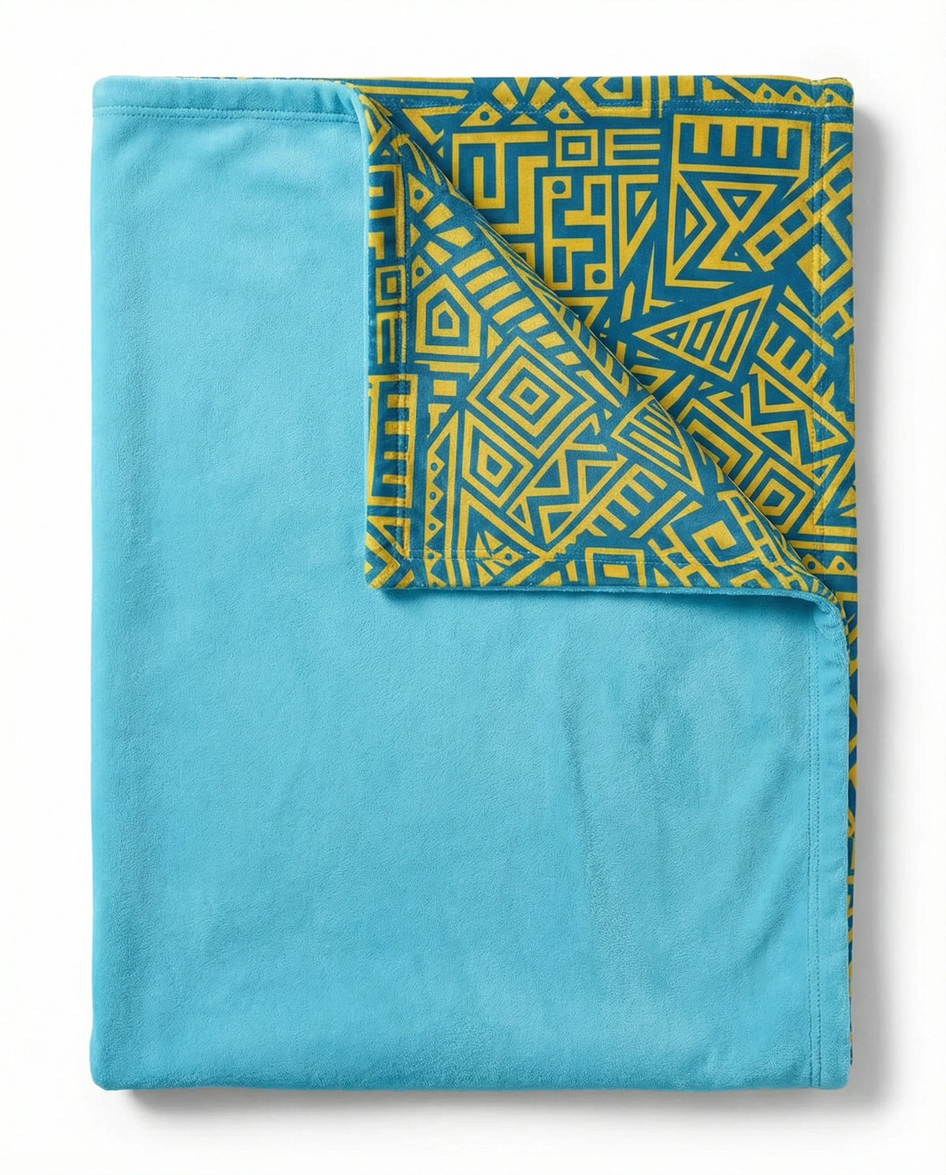 Back view of an African geometric pattern fleece blanket in green and yellow tones, displayed flat to highlight the bold tribal design