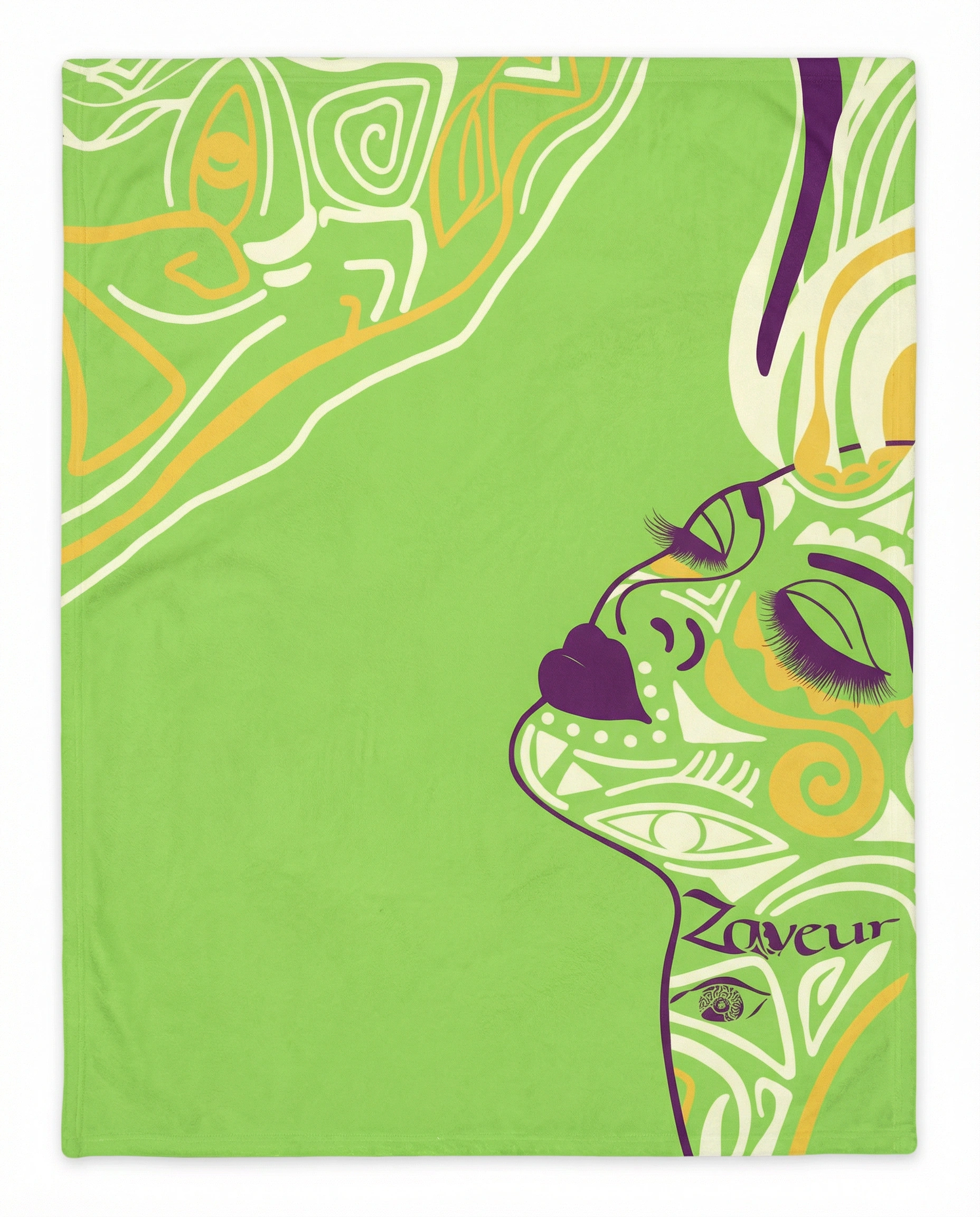 Front view of an artistic green throw blanket featuring a stylized face illustration with abstract line art in green, cream, yellow, and purple tones.