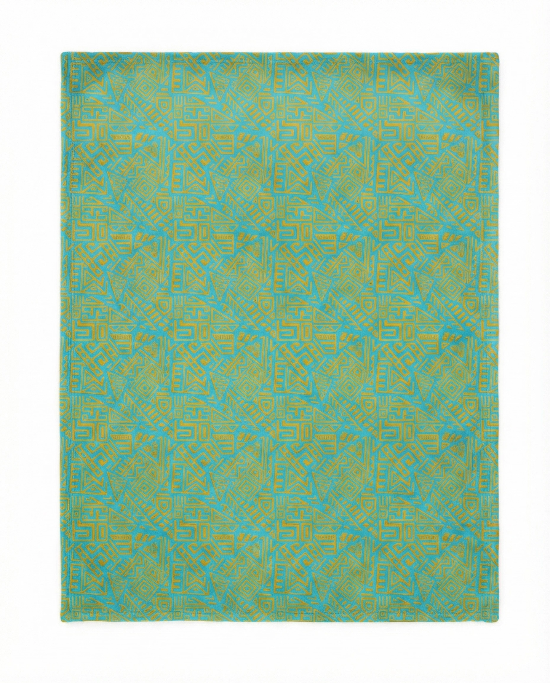 Back view of a blue fleece blanket showcasing a bold African geometric pattern in white, laid flat on a clean white background