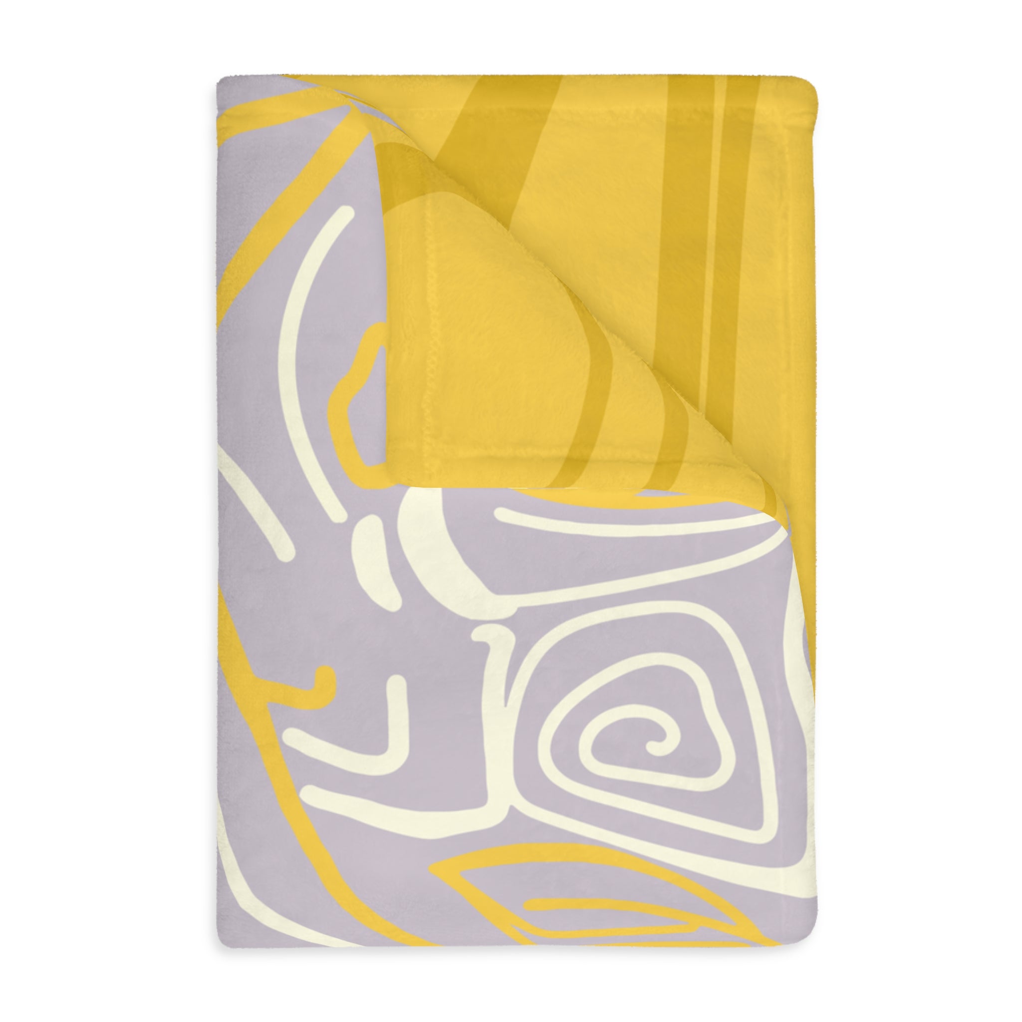 Folded reversible fleece blanket showing both the soft purple artistic face design and the yellow abstract patterned reverse side.