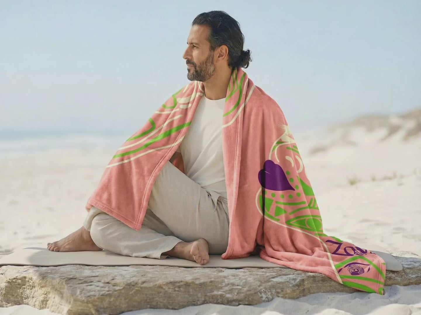 Lifestyle video showcasing an African tribal art fleece blanket styled in natural surroundings, highlighting cultural design, warmth, and artistic expression